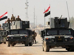 القوات العراقية تستعيد القائم ومعبرا حدوديا مع سورية