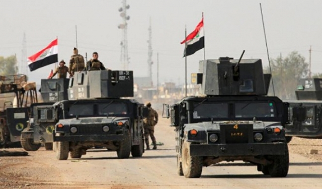 القوات العراقية تحارب 