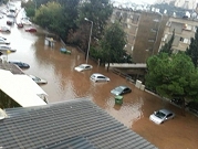 مياه الأمطار تتسبب بسيول وفيضانات وتغمر سيارات بحيفا وباقة