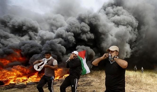مسيرة العودة: جمعة رفع العلم الفلسطيني وحرق الإسرائيلي