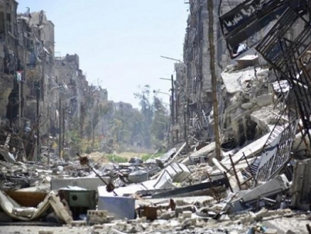 قتيلان ودمار كبير بقصف النظام لمخيم اليرموك