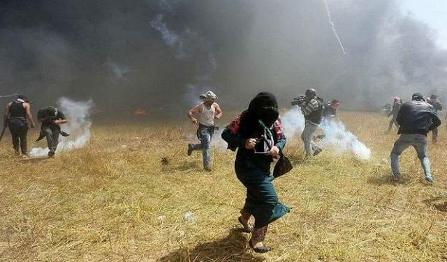إصابات في الضفة وغزة ومواجهات واعتقالات