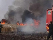 النيران تشتعل بحقول زراعية للمستوطنات المحيطة بغزة