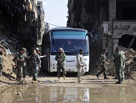 مقاتلون من "داعش" يغادرون ريف دمشق بالتوافق مع النظام