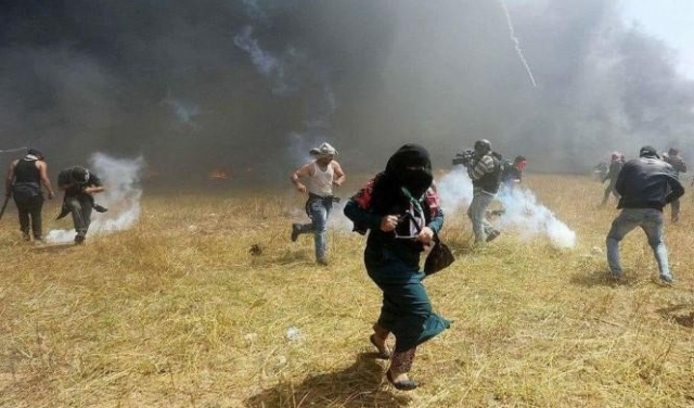 غزّة: شهيدان وأكثر من 415 مُصابا بسلاح الاحتلال