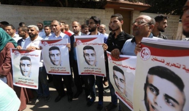 تشريح جثمان الشهيد الريماوي بحضور طبيب فلسطيني 