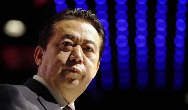 الصين تعترف باحتجاز مدير الإنتربول 