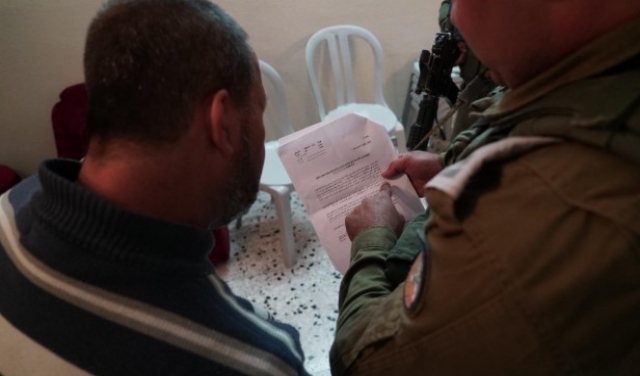 اعتقال 22 فلسطينيا والاحتلال يخطر بهدم منزل منفذ عملية 