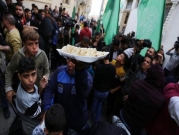 غزة: توزيع الحلويات احتفالا باستقالة ليبرمان 