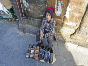 في شوارع صنعاء.. التسول في مواجهة الجوع