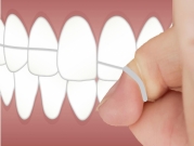 خيط الأسنان قد يحتوي على مواد سامة 
