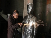 فنان فلسطيني يحول "ظريف الطول" إلى تمثال حديدي
