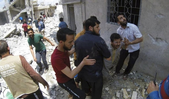مقتل 12 مدنيا بينهم 5 أطفال بقصف صاروخي على حلب
