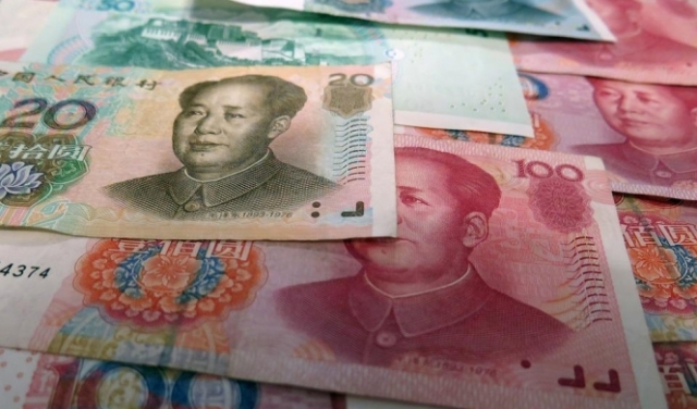 رئيسة بنك صيني تدعو لتكثيف الجهود لتحويل اليوان لعملة عالمية