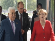 خلال اجتماعه بميركل: عباس يجدد استعداده للتفاوض مع إسرائيل