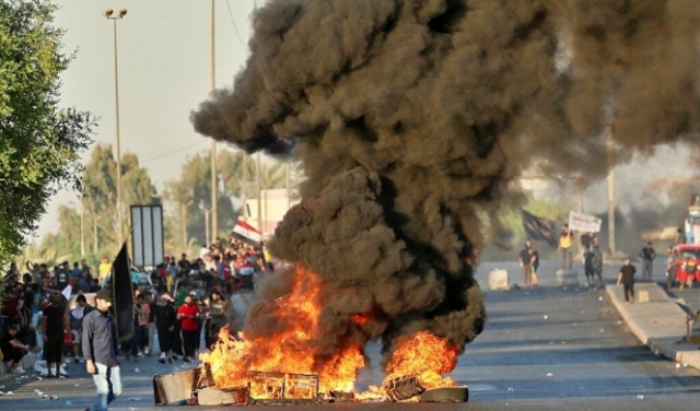 احتجاجات العراق: عدد القتلى تجاوز الـ100 وإحراق مقرات الأحزاب