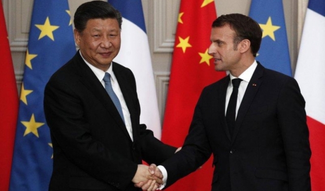 الصين تستقبل الرئيس الفرنسي وتحذره من التدخل بملف هونغ كونغ