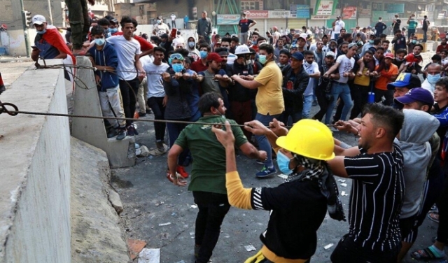 العراق: قتلى في قمع الأمن للمتظاهرين وسط بغداد