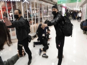 هونغ كنغ: اعتقال 12 متظاهرا ومطالب برحيل التجار الصينيين