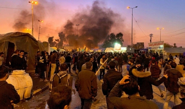 ارتفاع ضحايا الهجوم على ساحة الاعتصام في النجف إلى 11 قتيلا