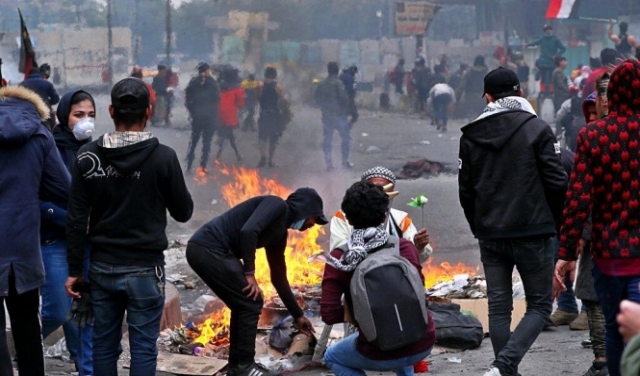 إصابات في مواجهات بين قوات الأمن ومحتجين وسط بغداد