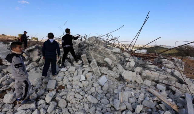 الاحتلال يهدم منزلا في حزما ويجرف أراض في نابلس