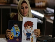 الفنانة نيفين أبو سليم مع رسوماتها الكرتونية حول فيروس كورونا