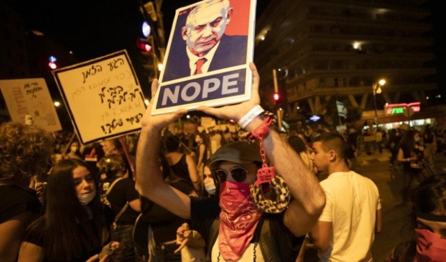 تظاهرة حاشدة في تل أبيب ضد نتنياهو والاعتداء على متظاهرة