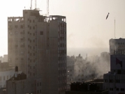 عدسة كاميرا ترصد لحظة استهداف الصاروخ لبرج الشروق بغزة