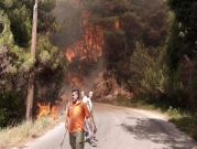 حرائق أحراش الشمال اللبنانيّ تواصل الانتشار وتقترب من المنازل