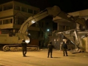 الاحتلال يهدم 30 منشأة تجارية قرب حاجز قلنديا