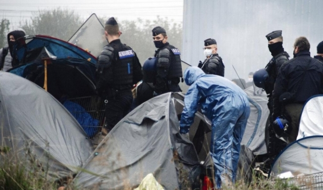الشرطة الفرنسية تفكك مخيما للمهاجرين في غراند سينث