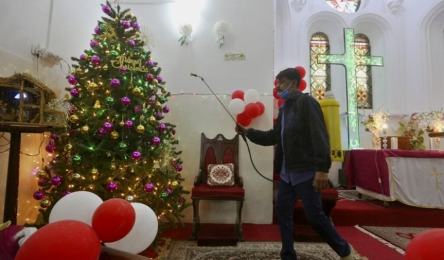 الوباء يرخي بظلاله للعام الثاني على احتفالات عيد الميلاد في العالم 