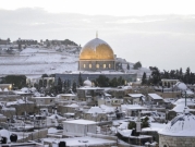 القدس المحتلة بعد اكتسائها بالثلوج