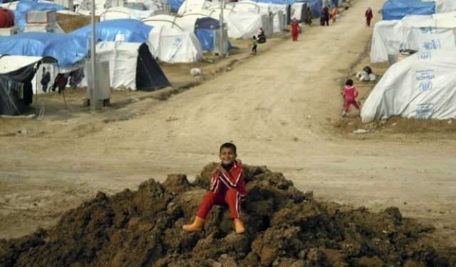 مئات اللاجئين العراقيين يعودون إلى بلادهم من سورية