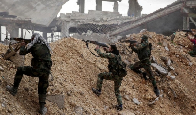 تقرير: عمليات تجنيد واسعة لدفع سوريين للقتال في أوكرانيا