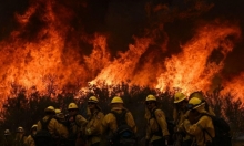 لوس أنجليس: جهود لإخماد حرائق الغابات.. واستعدادات لمواجهة فيضانات وسيول