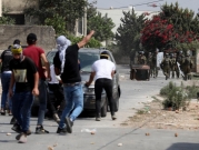 اعتقالات بالضفة واشتباكات في نابلس والخليل