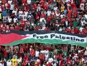 العلم الفلسطينيّ ملوّنًا كأس العالَم