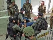 عقوبة مخففة على أفراد شرطة إسرائيليين عذبوا وسرقوا عمالا فلسطينيين