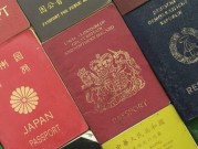 ما هو لون جواز سفرك؟