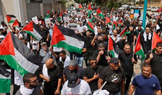 أمنستي: منع رفع العلم الفلسطيني محاولة لطمس هوية شعب ومخالف لحقوق الإنسان