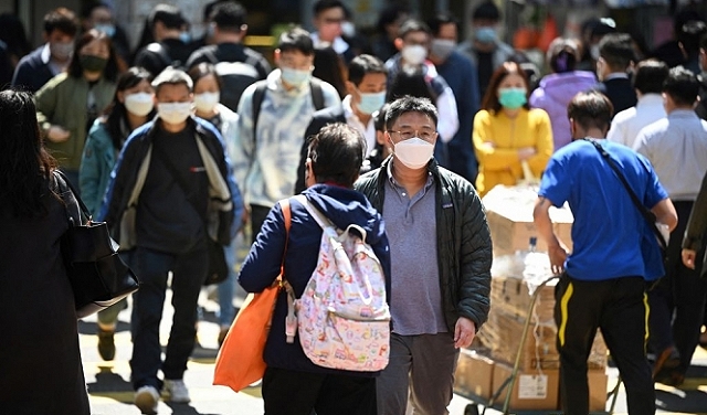 بايدن يصدر قانونا لرفع السرية عن منشأ فيروس كورونا بالصين