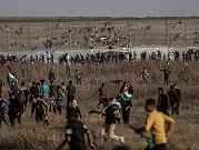 غزة: إصابات بقمع الاحتلال لمسيرة أعلام فلسطينية قرب السياج الفاصل