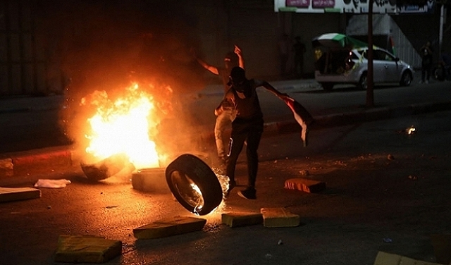 الضفة: الاحتلال يعتدي على أسيرين محررين ويعتقلهما