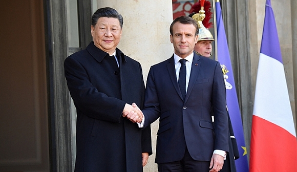 الرئيس الصيني يبحث بفرنسا العلاقات التجارية وأزمة أوكرانيا