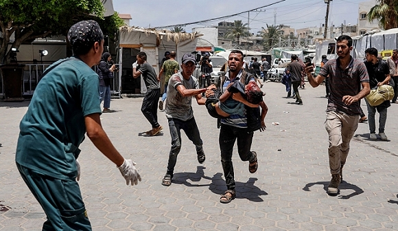 الإعلام الحكومي في غزة: 210 شهداء وأكثر من 400 جريح في مجزرة النصيرات